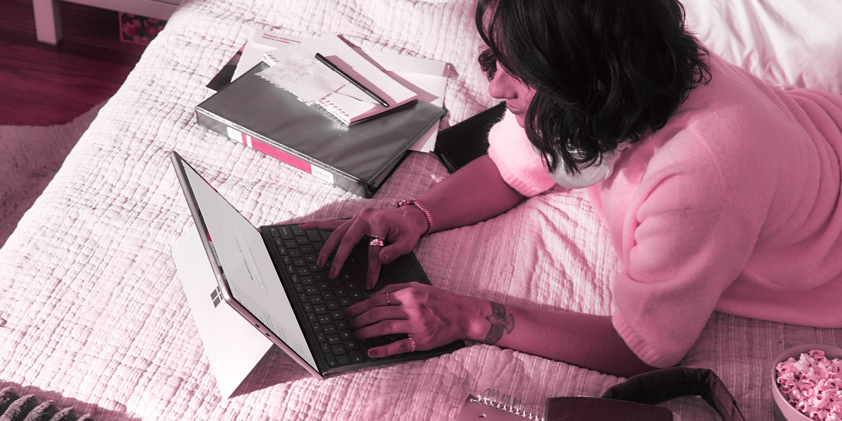 woman typing on laptop